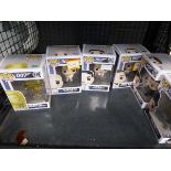 Cage containing Funko Pop! James Bond head figures