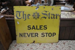 Enamel sign of the Star: Sales Never Stop