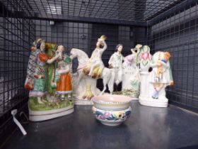 Cage containing Staffordshire flat back figures and a Poole bowl