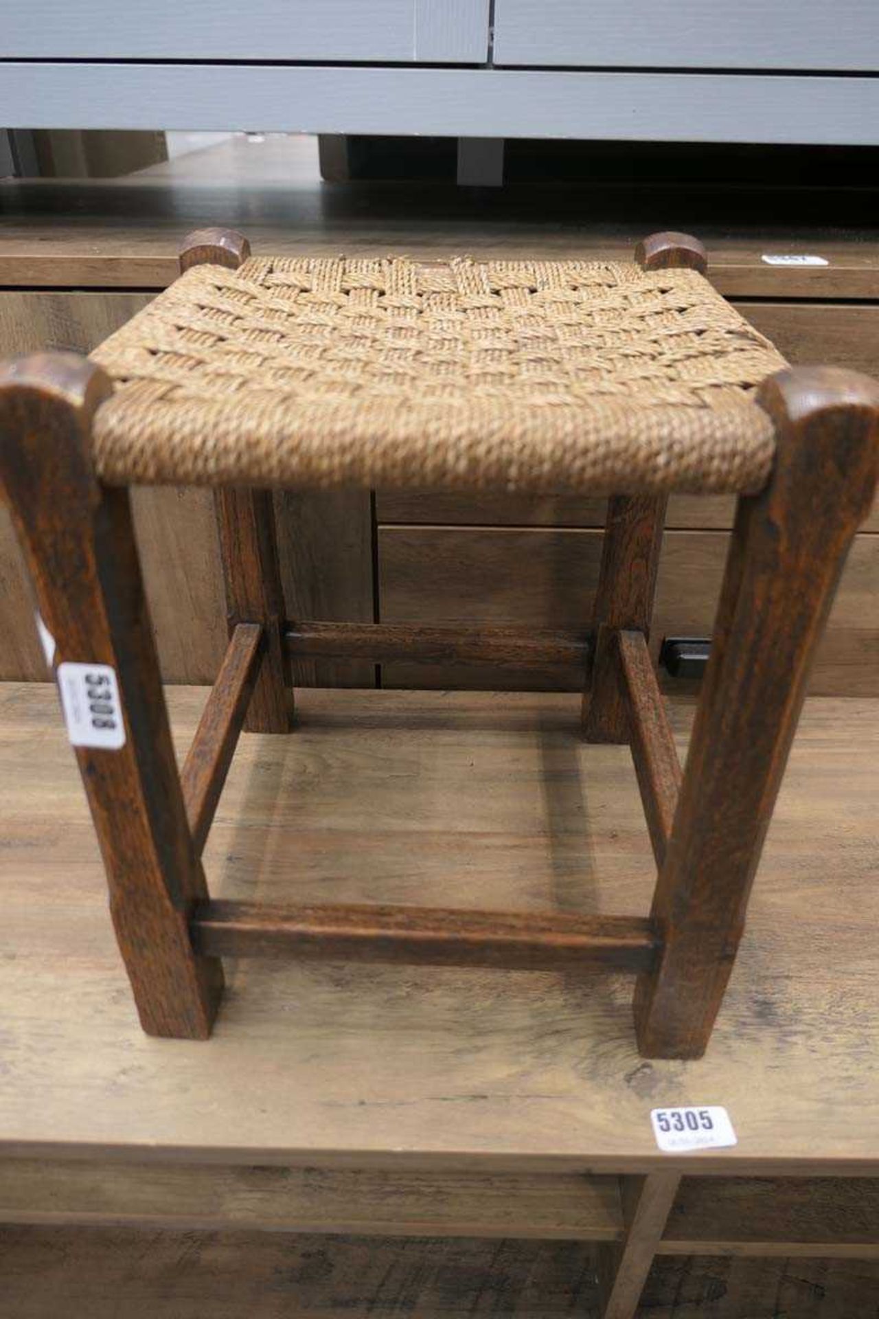 Wicker topped stool with oak frame