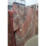 (4) All wool rug in pink with floral design