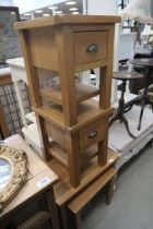 Two oak single drawer bedside cabinets and nest of 2 tables