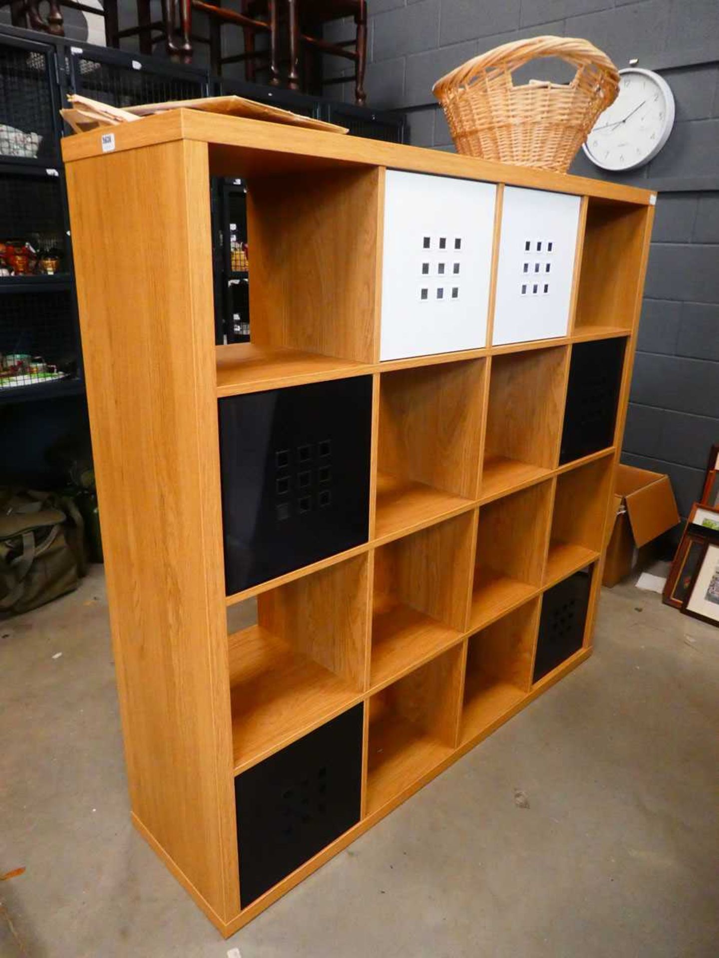 Oak effect pigeon hole storage shelving unit with white and black slide out drawers