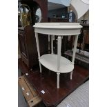 Cream oval occasional table with shelf under