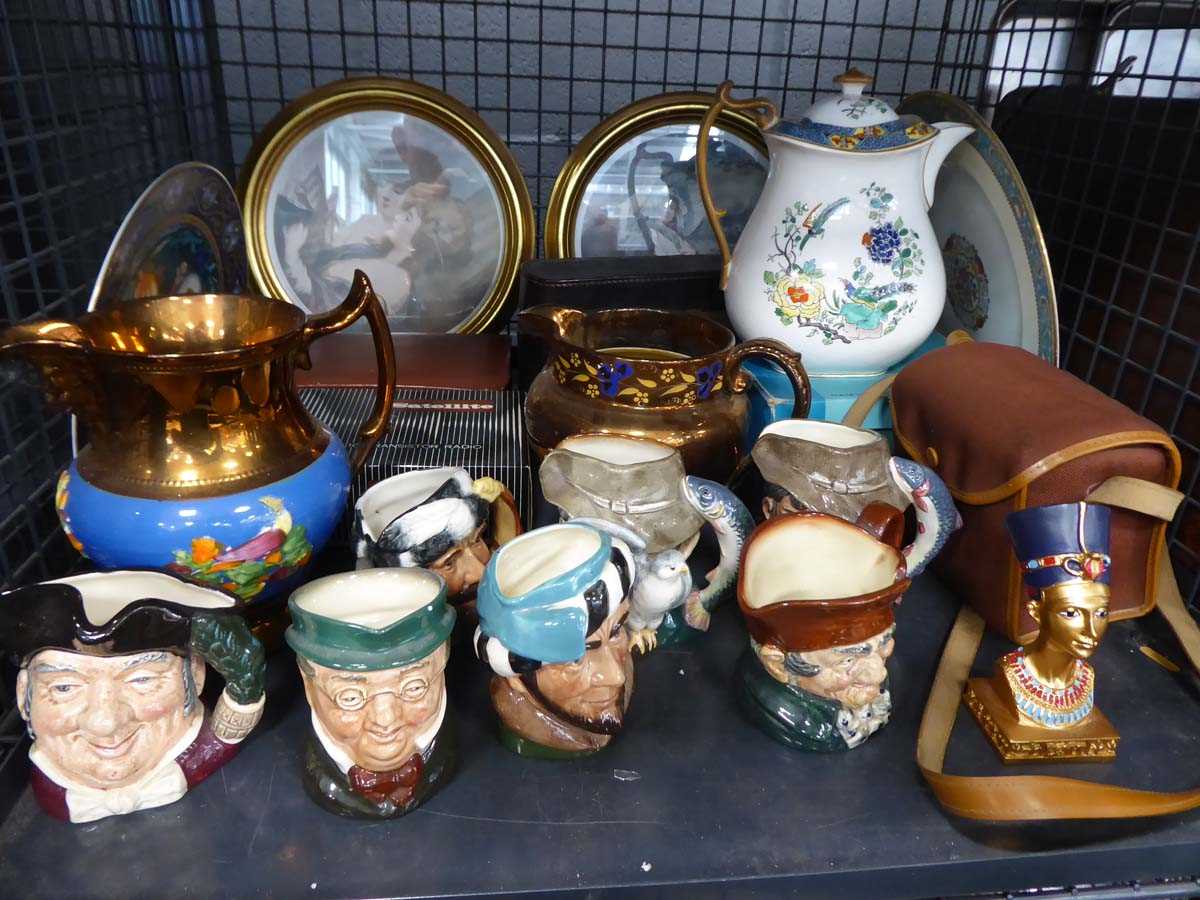 Cage containing mini Doulton Toby jugs, camera, circular framed portraits, collectable plates and