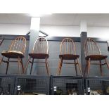 4 dark wood Ercol chairs