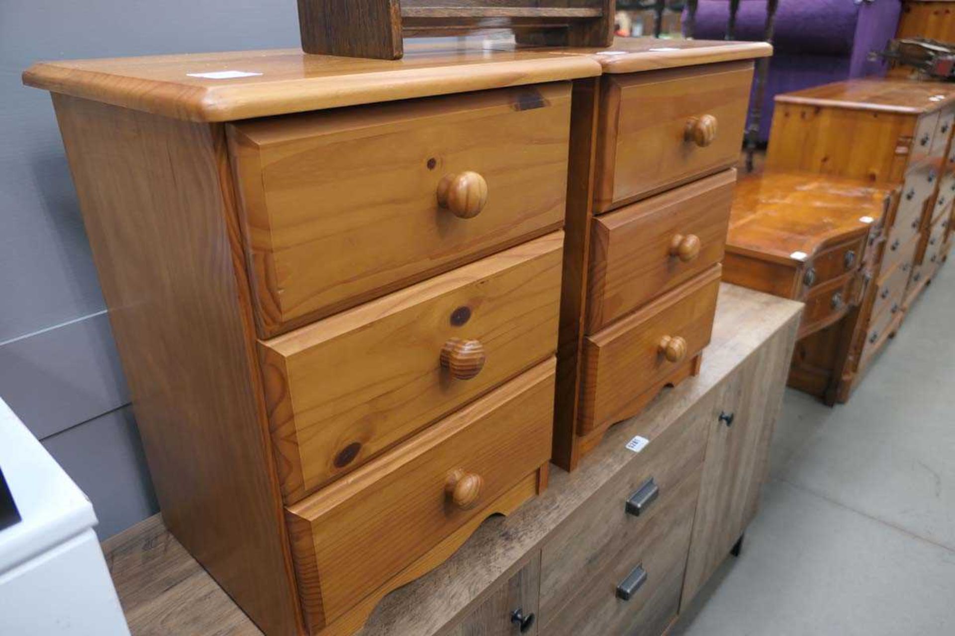 Pair of pine 3 drawer bedside cabinets