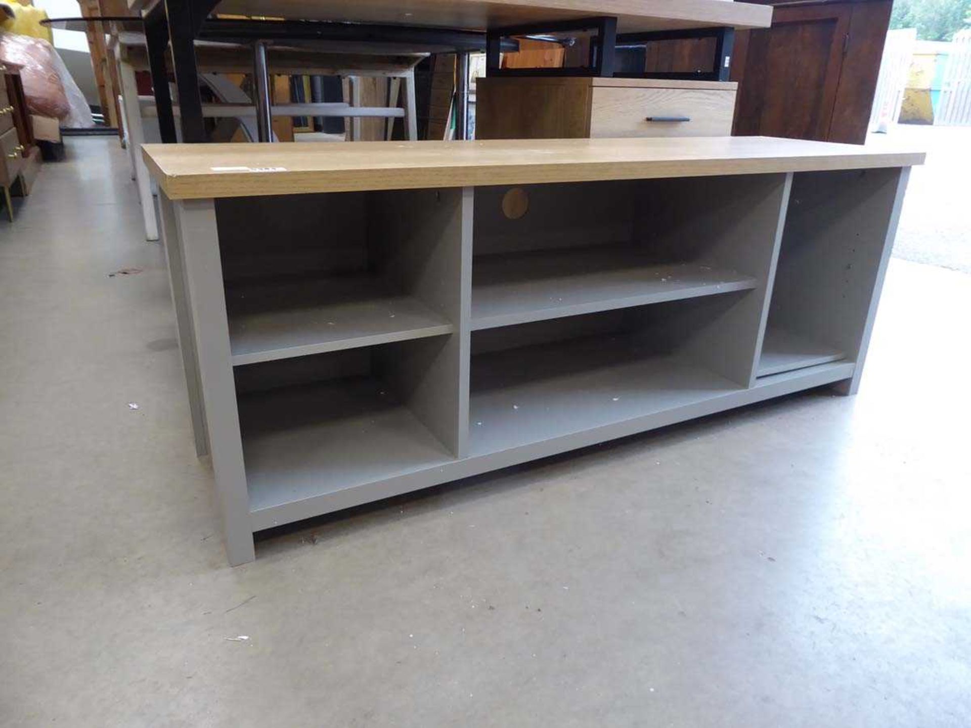 Grey low shelving unit with oak top