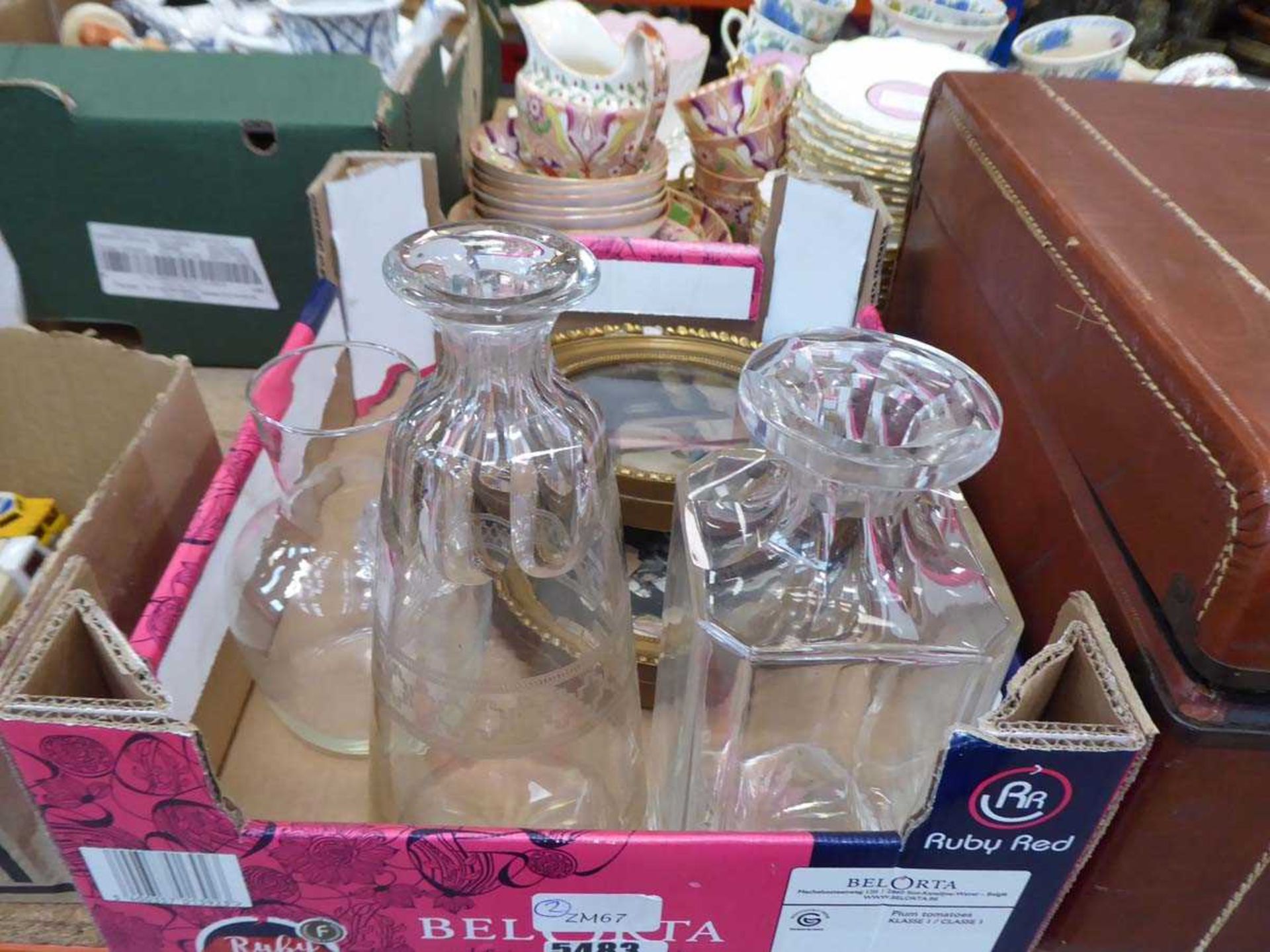 (2) Box of decanters, circular pitchers