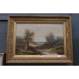 Gilt framed oil on canvas, riverside scene