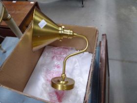 Brass finished wall light No noticeable dents or defects. Few small scratches on the inside of the