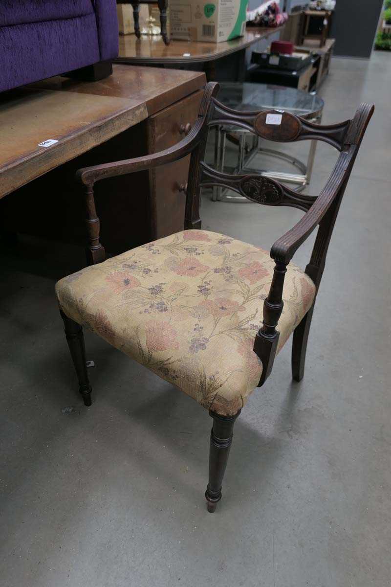 Single dark wood framed armchair with floral upholstery