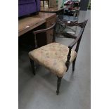 Single dark wood framed armchair with floral upholstery