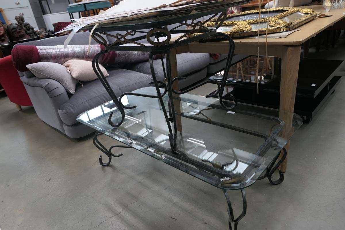 Two ornate scroll coffee tables with glass tops