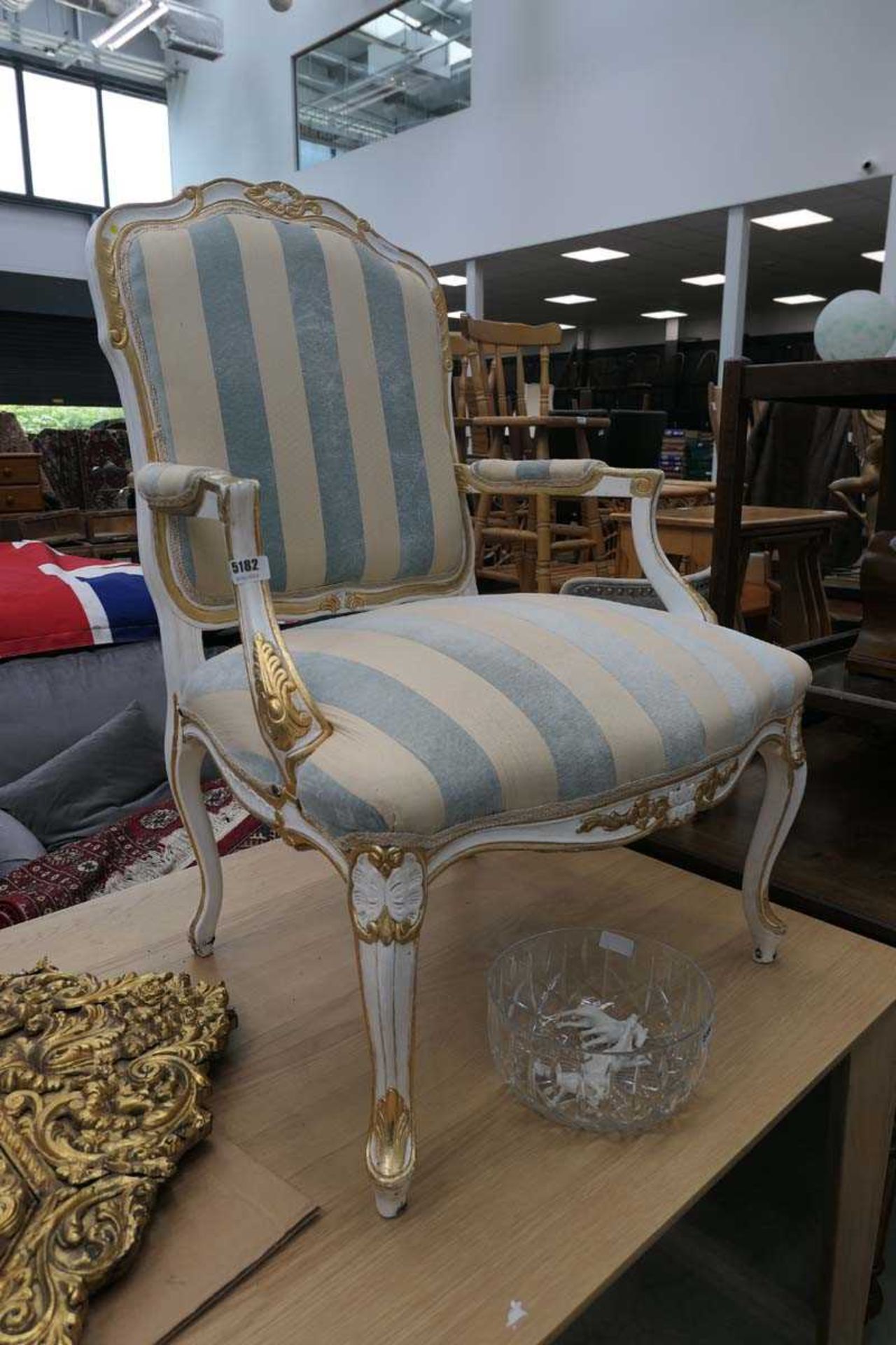 White and gilt frame armchair with blue and beige stripped upholstery