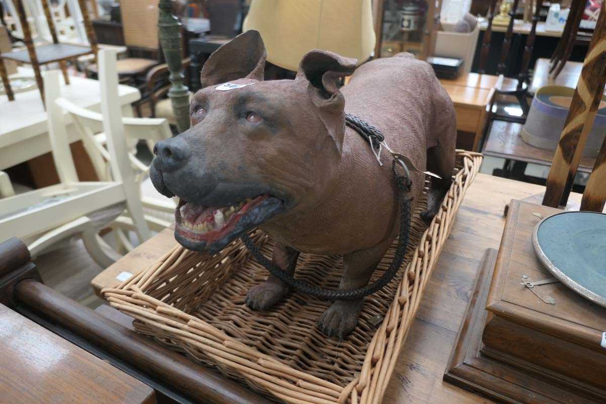 Figure of a Staffy dog and a wicker basket