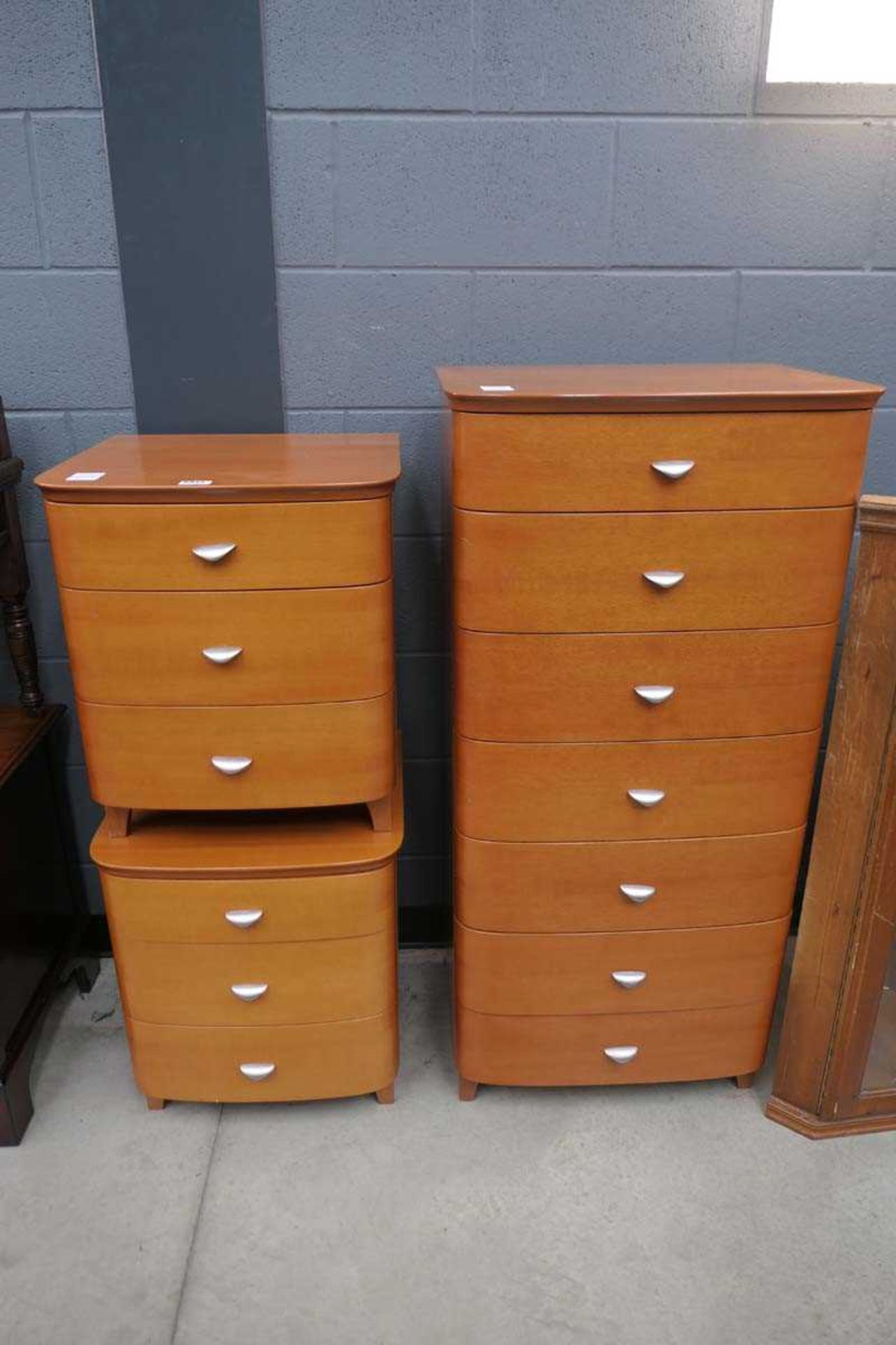 Pair of modern 3 drawer bedside cabinets and a matching 7 drawer chest
