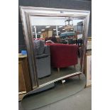 Large silver framed rectangular mirror and an oval mirror