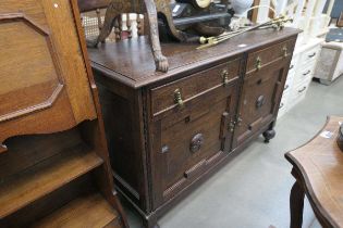 Dark wood sideboard with 2 drawers over 2 doors