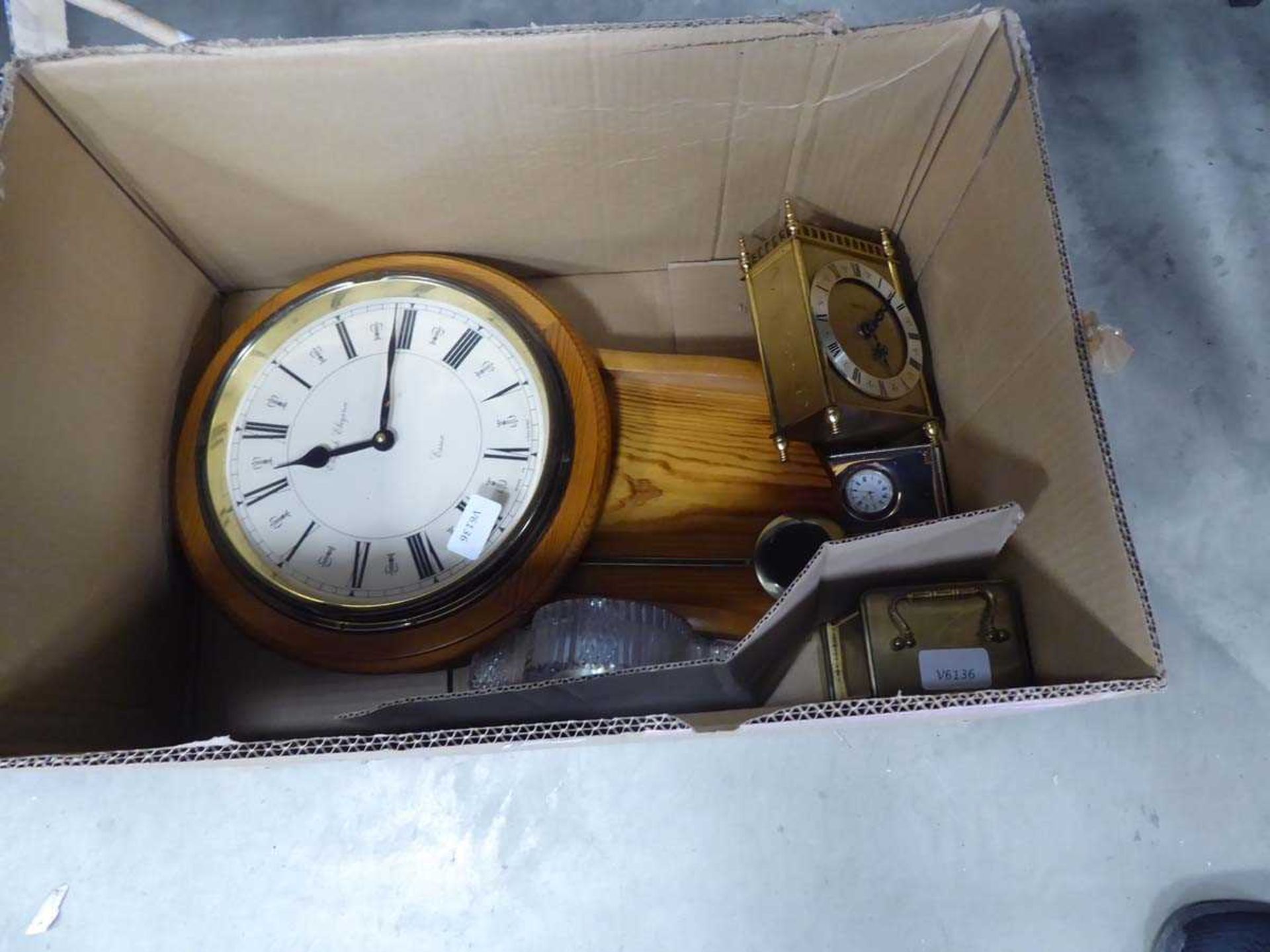 Quantity of wall and mantel clocks