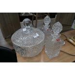 Three pieces of bohemian glass to include decanters and large lidded bowl
