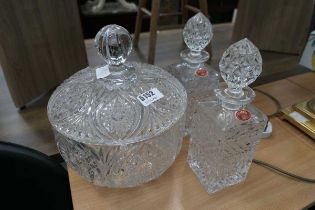 Three pieces of bohemian glass to include decanters and large lidded bowl