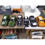 6 assorted ceramic car models to include Beetles, Porsches etc