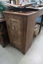Court cupboard with carved panel