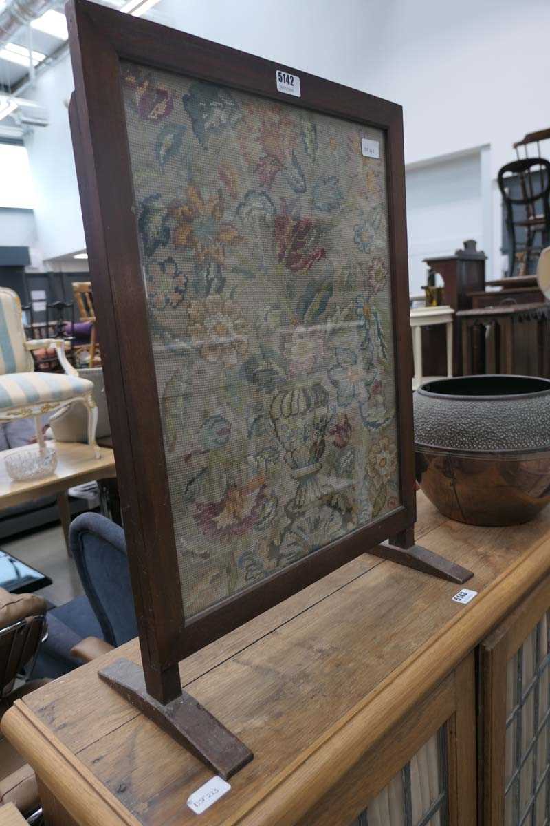 Embroidered fire screen