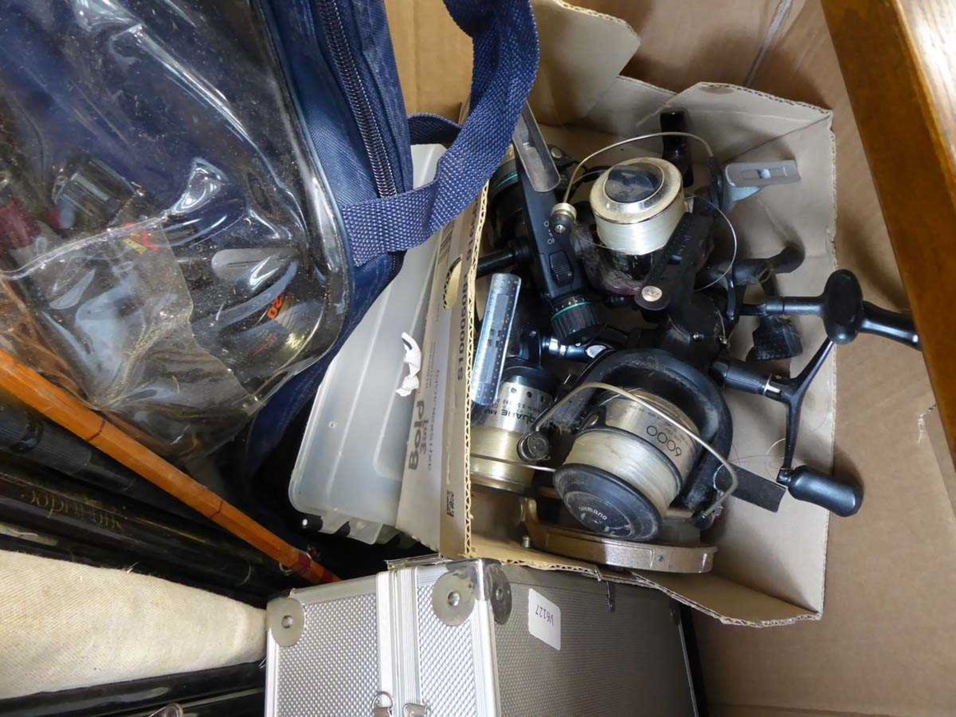 Large quantity of fishing rods and assorted fishing reels - Image 2 of 2