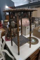Bamboo occasional table with bird and floral inlay
