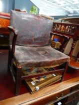Single leatherette armchair on dark wood frame