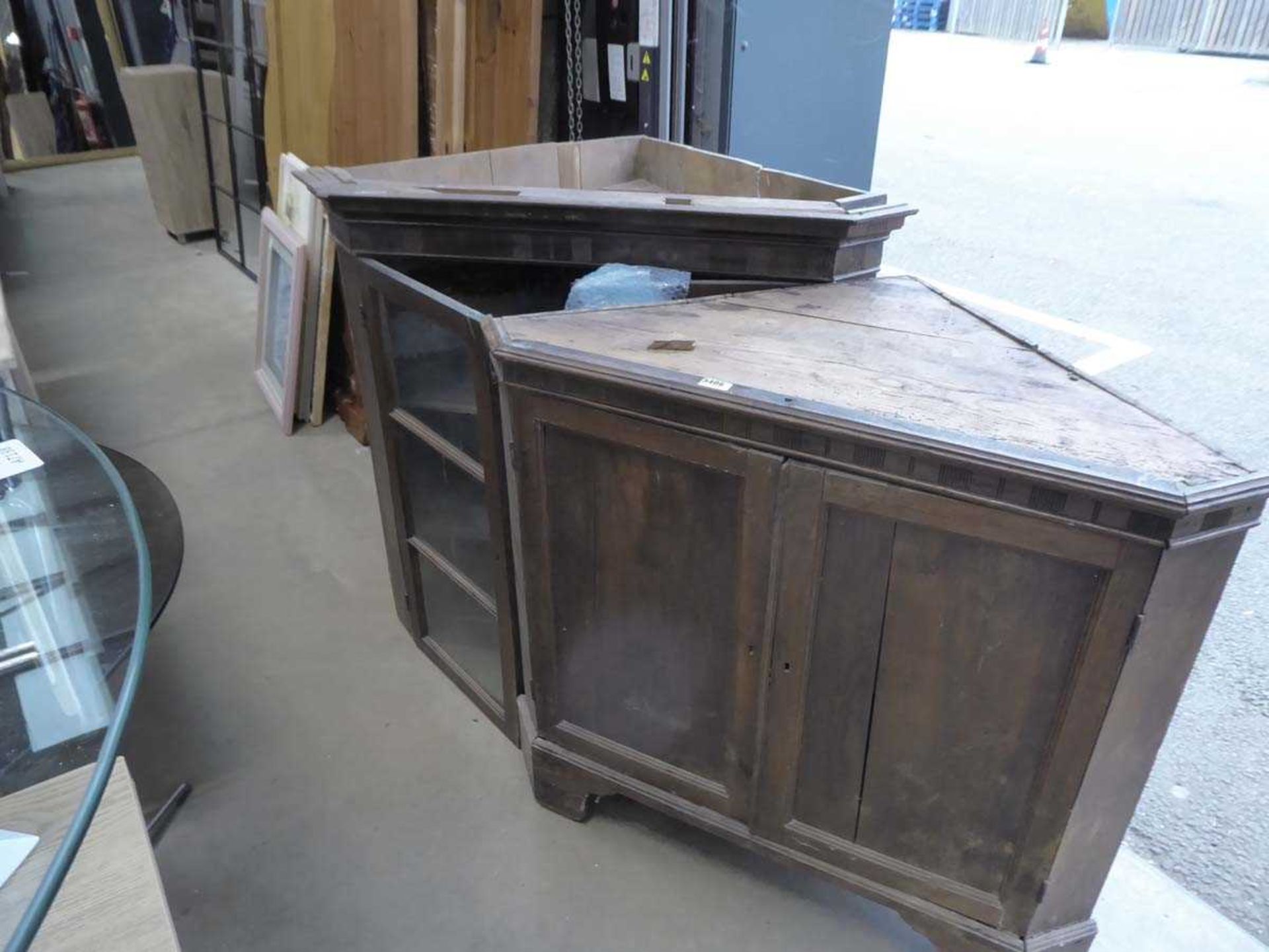 19th century oak and glazed corner cupboard Crack in top left glass panel. Cracks in both solid