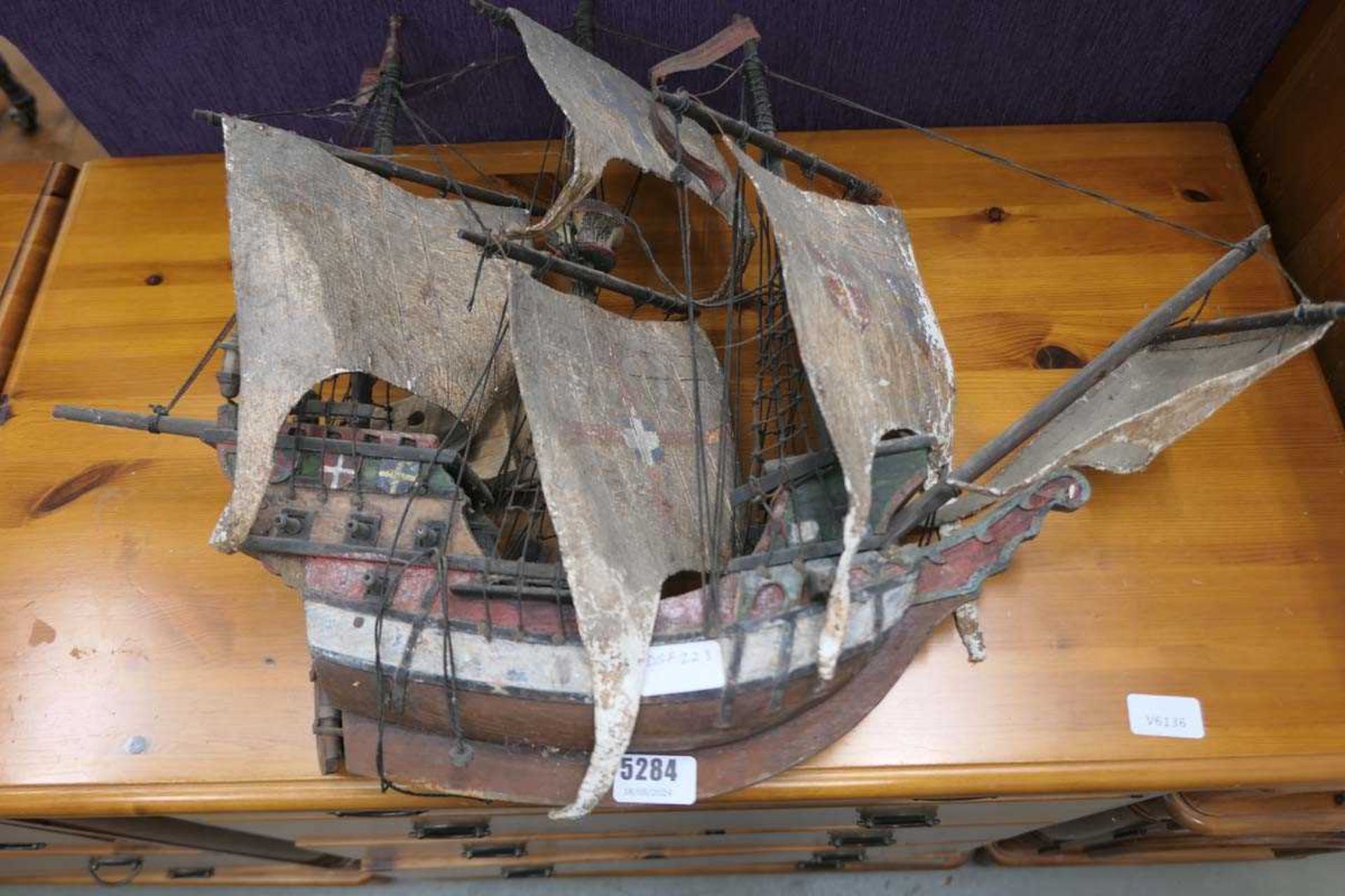 Wooden figure of a vintage battleship