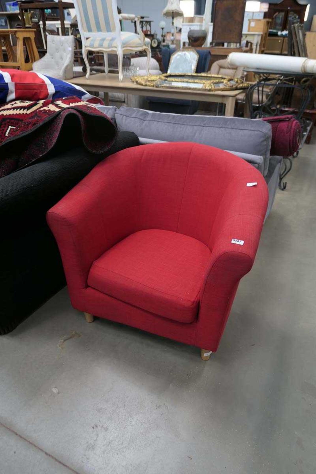 Red cloth tub chair