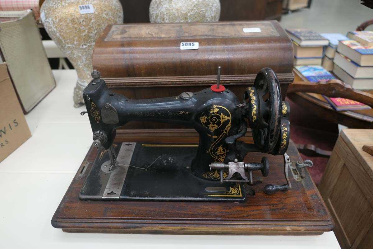 Cased sewing machine