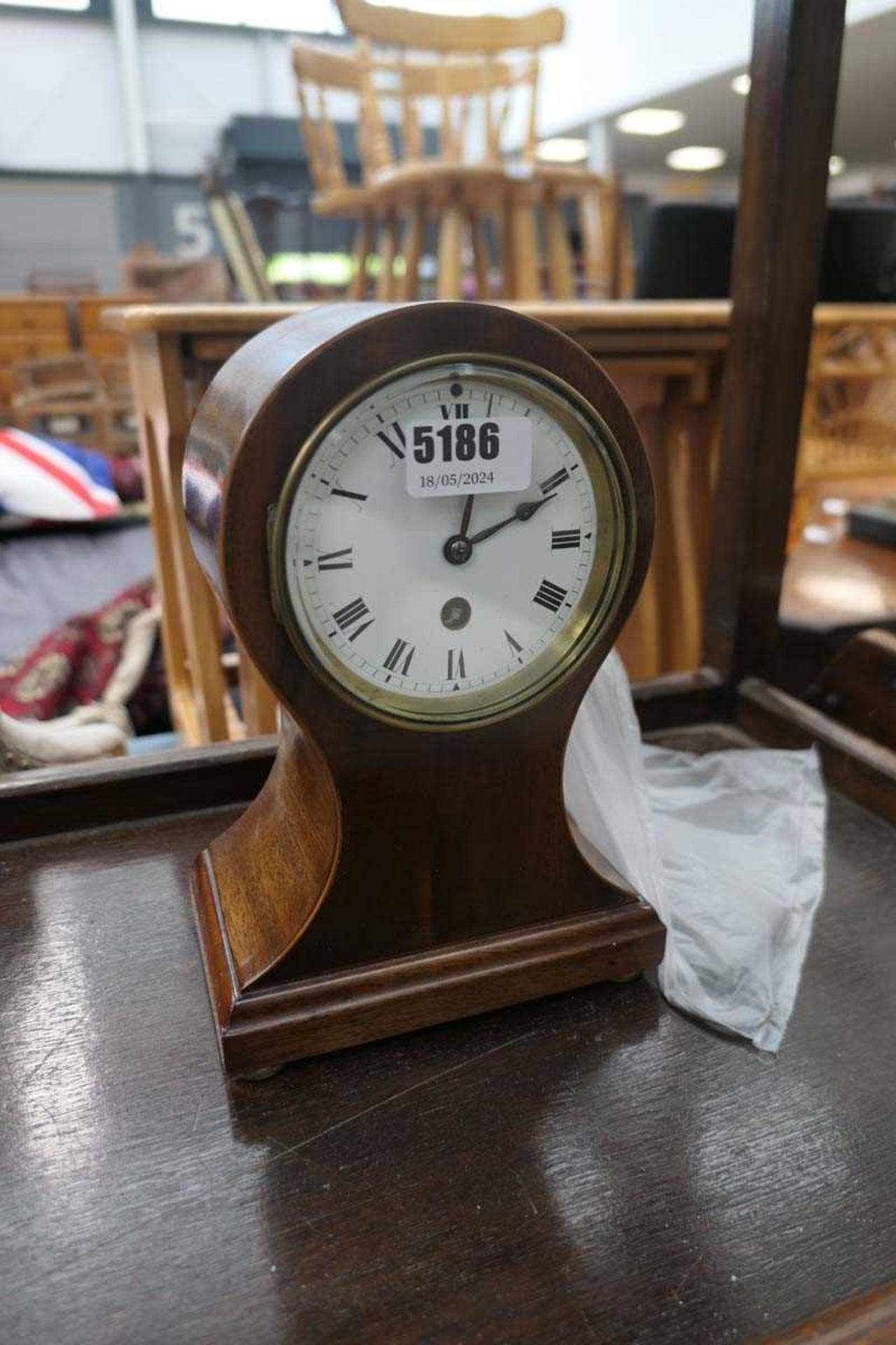Small wood cased mantel clock