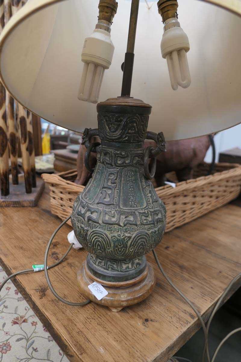 Table lamp and a standard lamp with turned metal bases and oriental design - Image 2 of 2