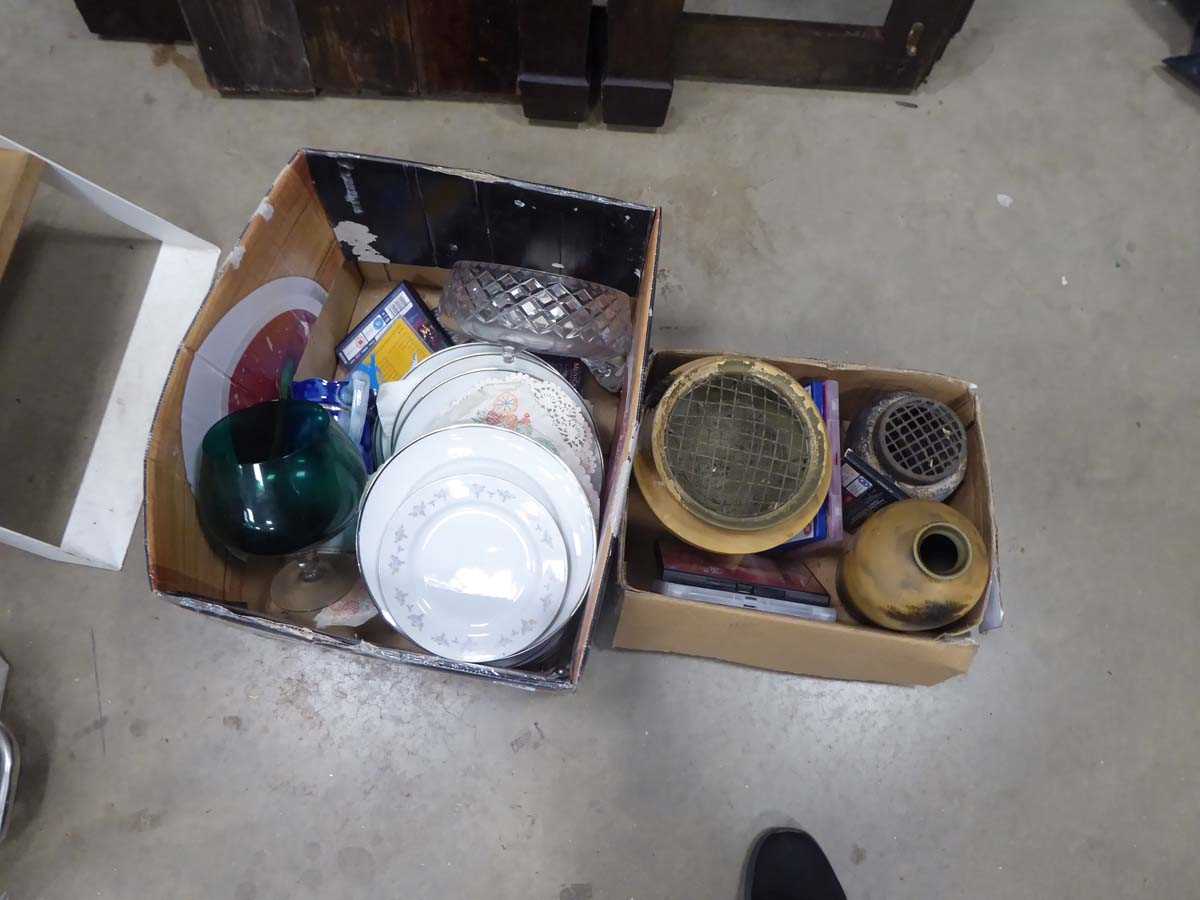 Two boxes of assorted household items to include vases, bowls, DVDs, plates etc