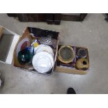 Two boxes of assorted household items to include vases, bowls, DVDs, plates etc