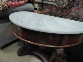 Marble topped demi lune table on ball and claw feet