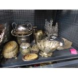 Cage of mainly white metal ware and a condiment tray with cut glass decanters