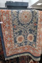 Single Voysey style rug in pale blue and terracotta