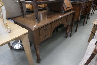 Dark wood kneehole desk