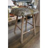 Limed oak stool with floral cushion