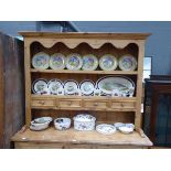 Large quantity of assorted china to include fish decorated plates, steam engine motif mugs,