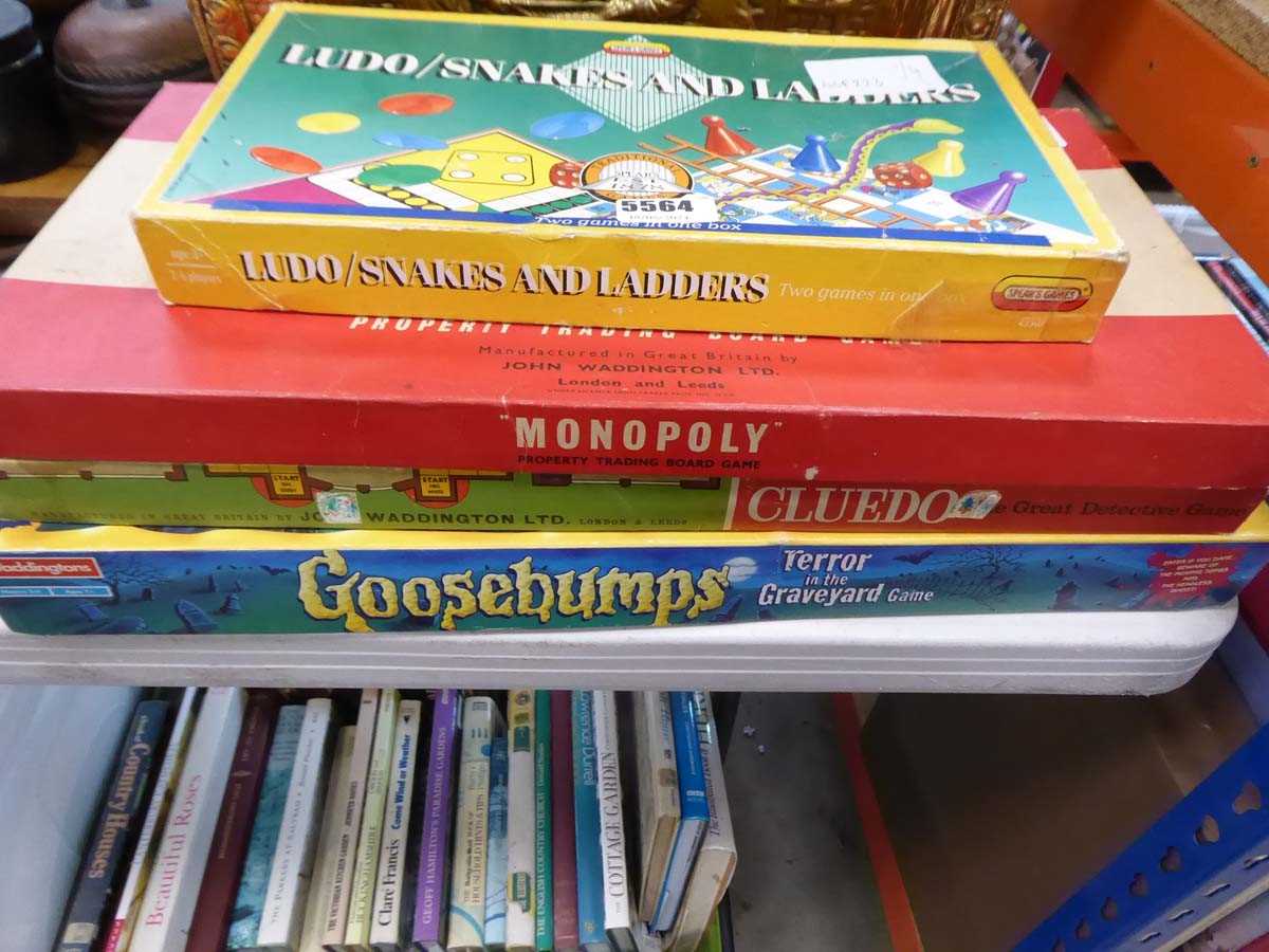 4 assorted children's games to include Monopoly, Cluedo etc