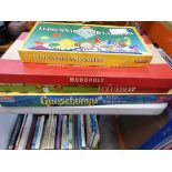 4 assorted children's games to include Monopoly, Cluedo etc