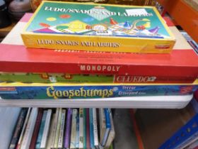 4 assorted children's games to include Monopoly, Cluedo etc