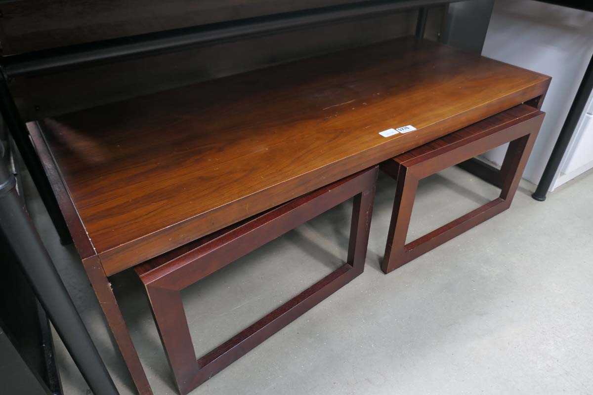 Dark wood coffee table with 2 slide out tables beneath